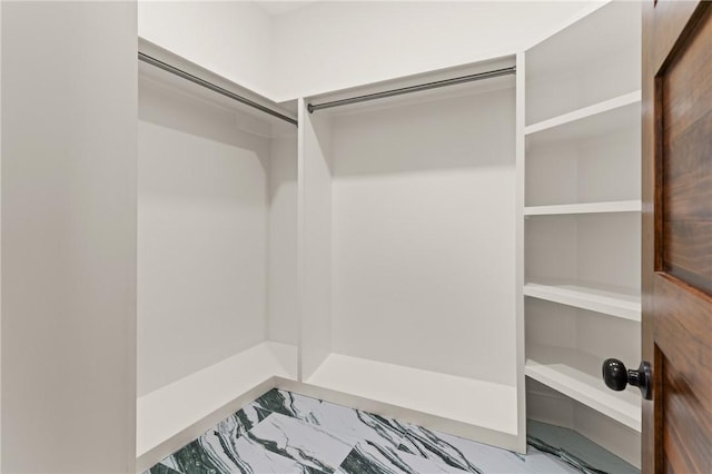 50 Frederica Oaks Ln, Saint Simons Island, GA 31522 - spacious closet featuring marble finish floors