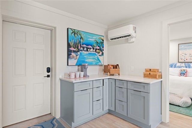 50 Frederica Oaks Ln, Saint Simons Island, GA 31522 - bar featuring a wall mounted AC and light wood-style floors