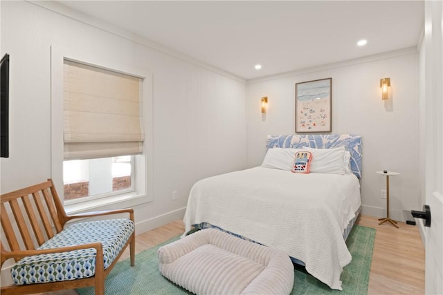 50 Frederica Oaks Ln, Saint Simons Island, GA 31522 - bedroom featuring light wood-style floors, ornamental molding, baseboards, and recessed lighting