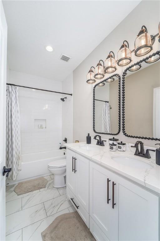 121 Farms Edge Rd S, Manor, GA 31550 - full bath featuring double vanity, shower / bathtub combination with curtain, recessed lighting, and marble finish flooring