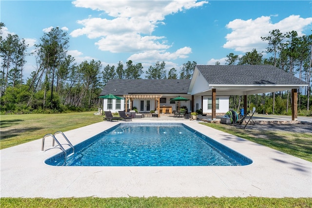 121 Farms Edge Rd S, Manor, GA 31550 - swimming pool with french doors, a patio, and a lawn