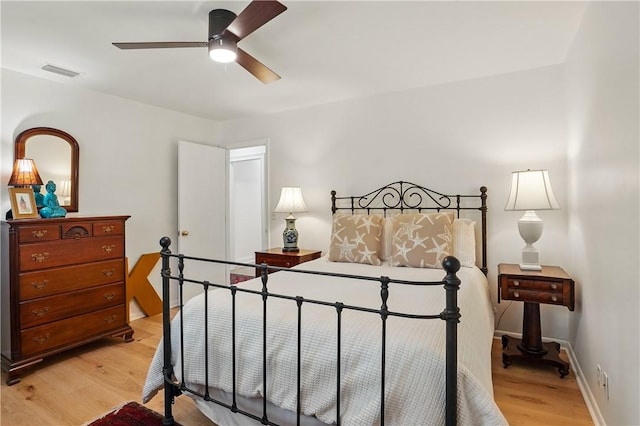 111 Palm Dr, Saint Simons Island, GA 31522 - bedroom featuring light wood-style floors and ceiling fan