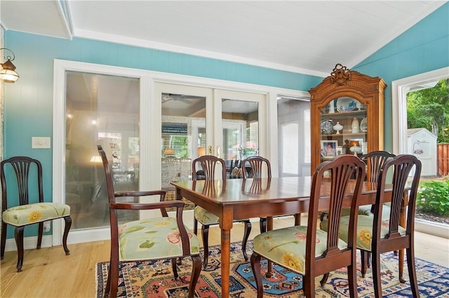 111 Palm Dr, Saint Simons Island, GA 31522 - dining space featuring lofted ceiling, light wood-type flooring, and a ceiling fan