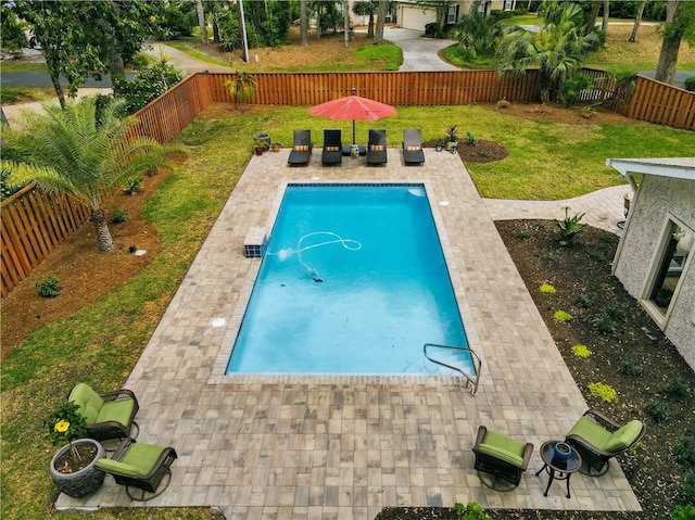 111 Palm Dr, Saint Simons Island, GA 31522 - view of pool featuring a patio, an outdoor hangout area, and a fenced backyard
