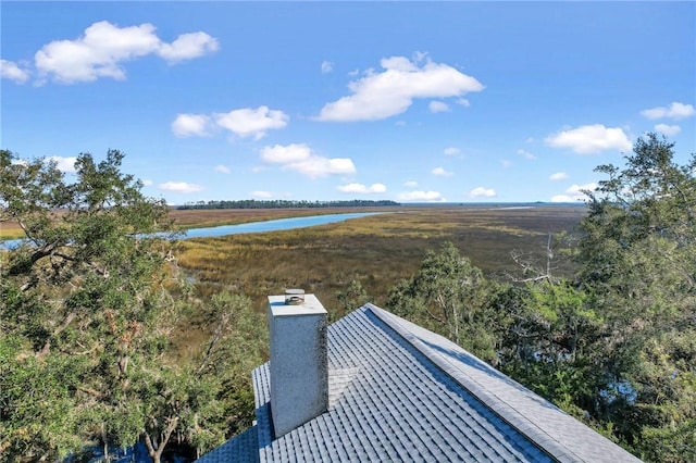 drone / aerial view with a water view