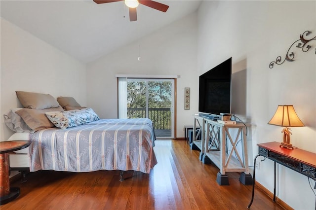 bedroom featuring ceiling fan, access to exterior, wood-type flooring, and high vaulted ceiling