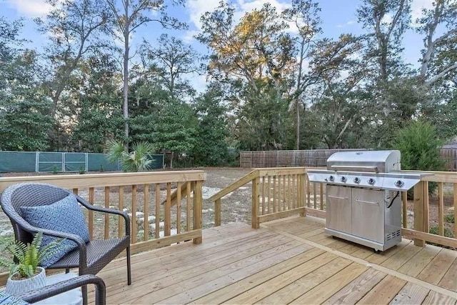 wooden terrace with grilling area