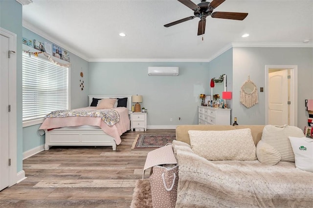 bedroom featuring a wall unit AC, ceiling fan, light hardwood / wood-style floors, and ornamental molding