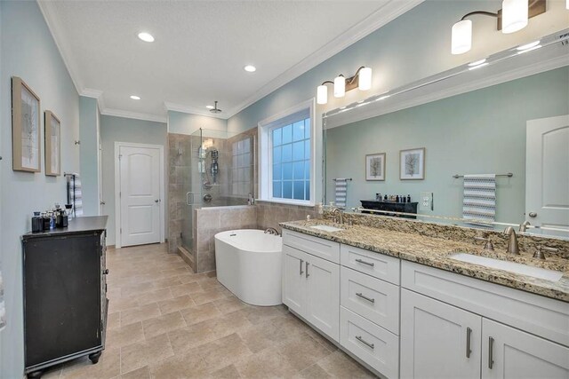 bathroom featuring vanity, ornamental molding, and plus walk in shower