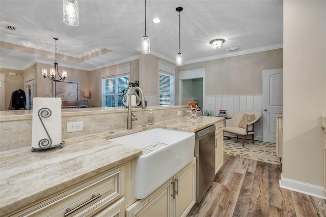 kitchen with dishwasher, sink, light stone counters, light hardwood / wood-style flooring, and pendant lighting