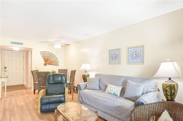 1524 Wood Ave Unit 314, Saint Simons Island, GA 31522 - living area featuring light wood-style flooring and ceiling fan