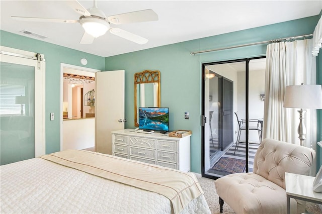 1524 Wood Ave Unit 314, Saint Simons Island, GA 31522 - bedroom featuring access to outside and ceiling fan