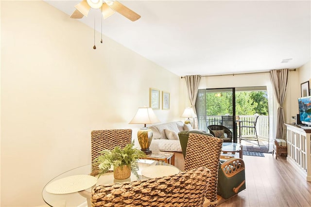 1524 Wood Ave Unit 314, Saint Simons Island, GA 31522 - living area with a ceiling fan and wood finished floors