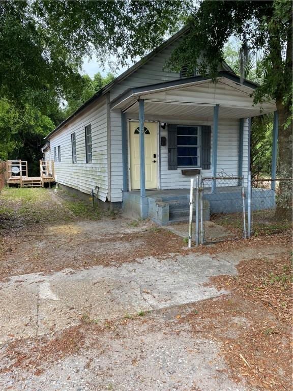 bungalow-style house featuring covered porch