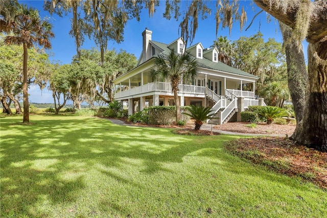 exterior space with a front yard and a porch