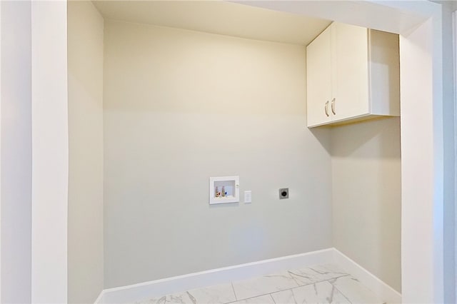 314 Norwich St, Brunswick, GA 31520 - laundry room featuring washer hookup, cabinet space, hookup for an electric dryer, and light marble finish floors