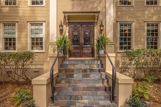 doorway to property featuring french doors