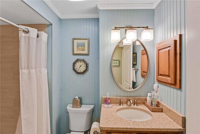 bathroom featuring vanity, toilet, walk in shower, and crown molding