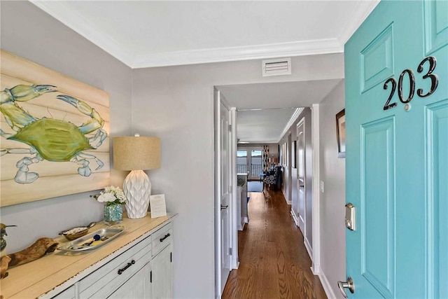 hallway with crown molding and dark wood-type flooring