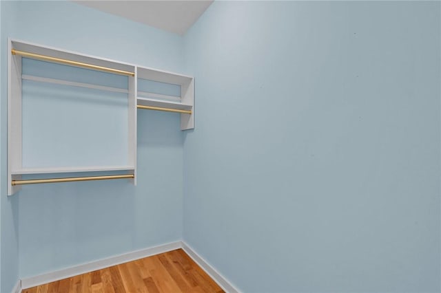 walk in closet featuring light wood-type flooring