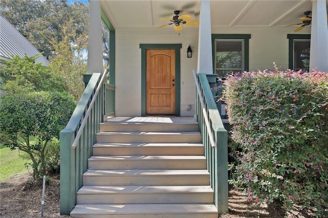 entrance to property with ceiling fan