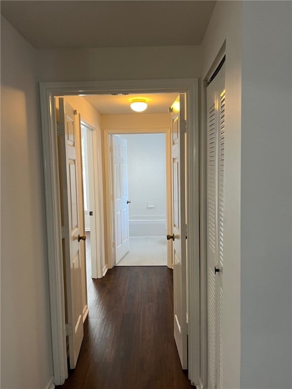 1704 Frederica Rd Unit 422, Saint Simons Island, GA 31522 - corridor with baseboards and dark wood finished floors