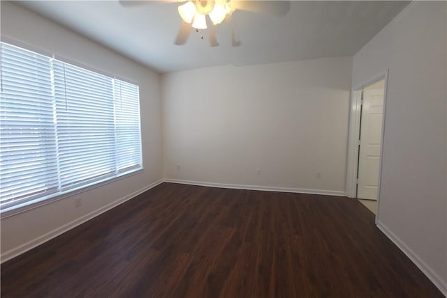 1704 Frederica Rd Unit 422, Saint Simons Island, GA 31522 - unfurnished room with a ceiling fan, dark wood finished floors, and baseboards