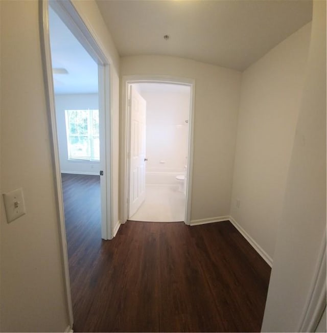 1704 Frederica Rd Unit 422, Saint Simons Island, GA 31522 - hallway with dark wood finished floors and baseboards