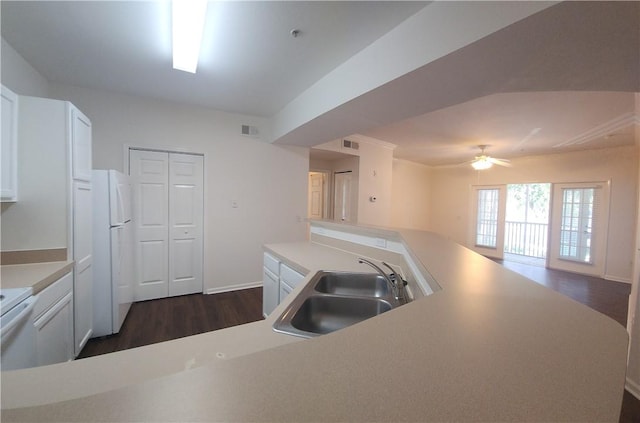 1704 Frederica Rd Unit 422, Saint Simons Island, GA 31522 - kitchen with a sink, dark wood-type flooring, freestanding refrigerator, open floor plan, and ceiling fan