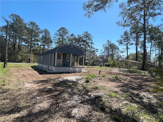 exterior space with an outbuilding