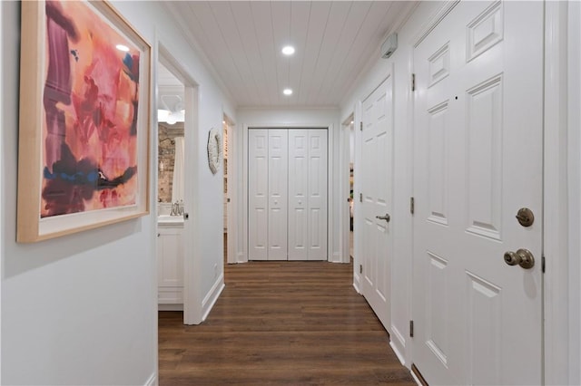 1035 Beachview Dr Unit 301, Saint Simons Island, GA 31522 - hall featuring dark wood-style floors, recessed lighting, baseboards, and crown molding