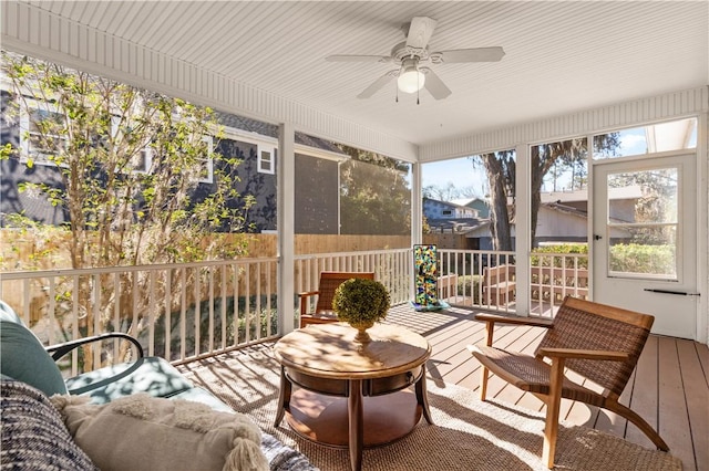 sunroom / solarium with ceiling fan