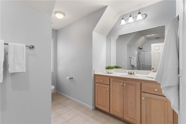 bathroom featuring a textured ceiling, an enclosed shower, tile patterned flooring, vanity, and toilet