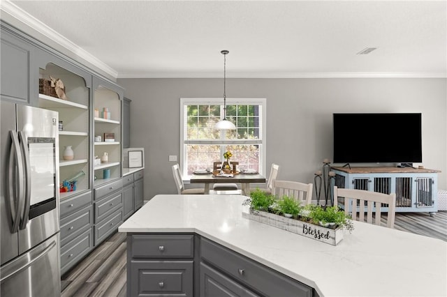 kitchen featuring smart refrigerator, crown molding, gray cabinets, and wood finished floors