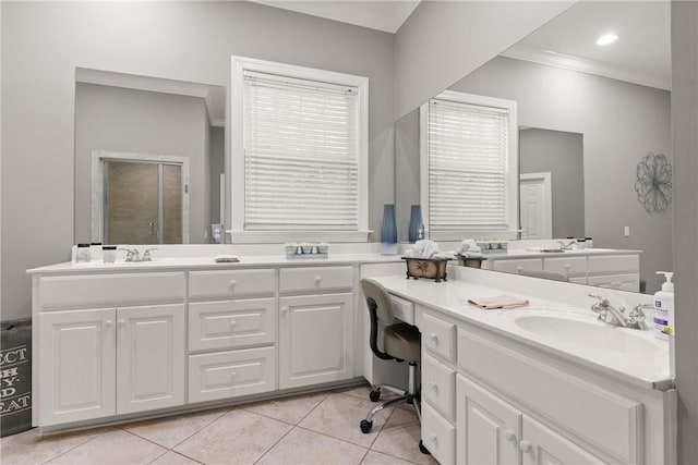full bath with vanity, ornamental molding, a shower with door, and tile patterned floors