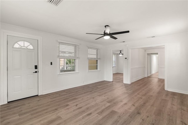 315 Pine St, Saint Simons Island, GA 31522 - foyer with ceiling fan and light wood-style flooring