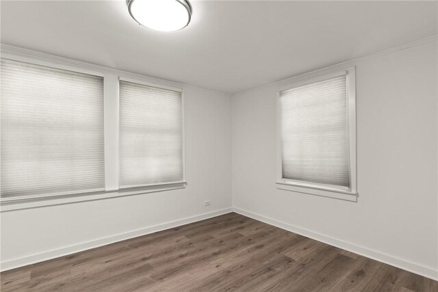 315 Pine St, Saint Simons Island, GA 31522 - empty room with wood finished floors and baseboards