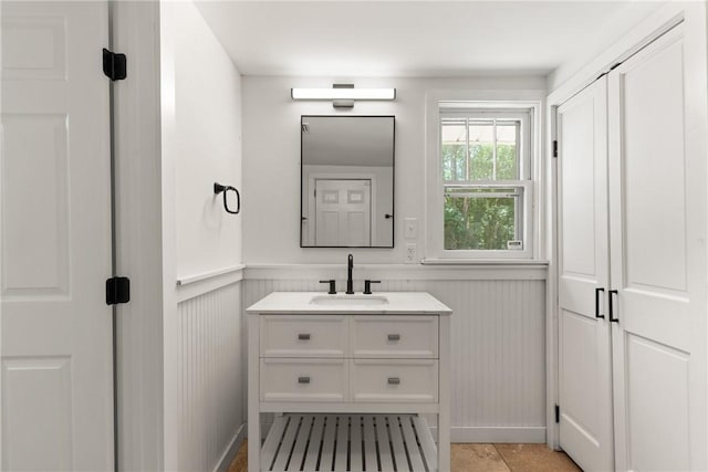 315 Pine St, Saint Simons Island, GA 31522 - bathroom featuring vanity and a wainscoted wall
