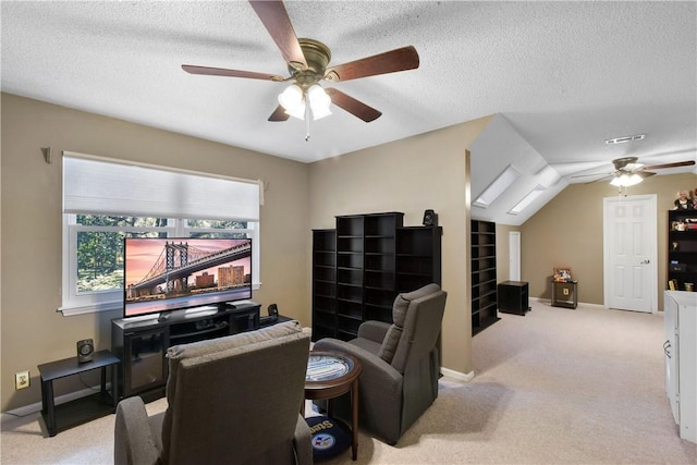 109 Mackay Cir, Brunswick, GA 31525 - carpeted home theater room featuring a textured ceiling, vaulted ceiling, and ceiling fan