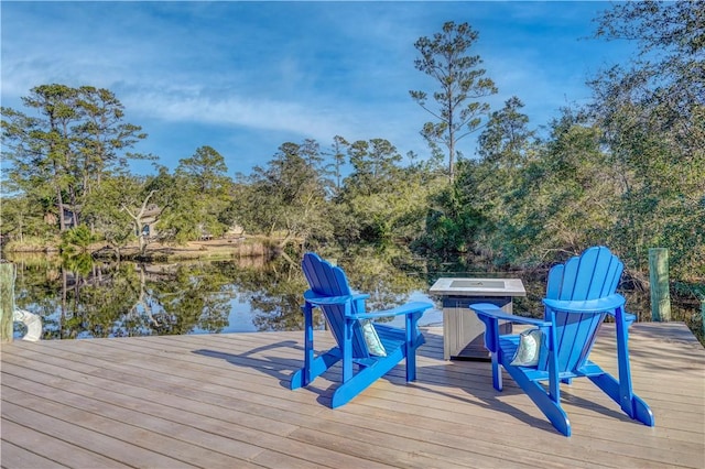 view of dock with a water view and a jacuzzi