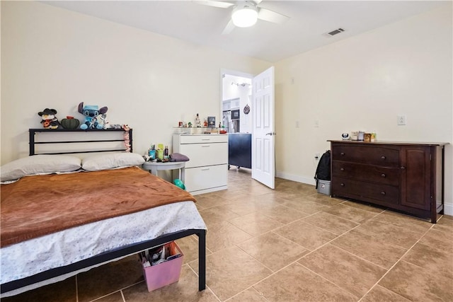 bedroom featuring visible vents, ceiling fan, baseboards, and light tile patterned floors