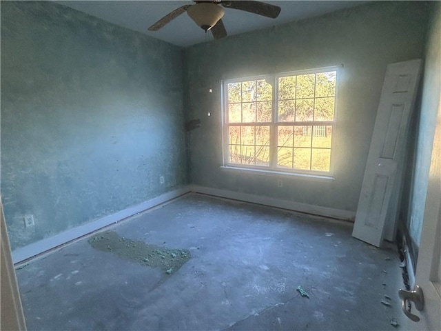 2657 Horseshoe Cv, Waverly, GA 31565 - spare room with concrete floors and ceiling fan