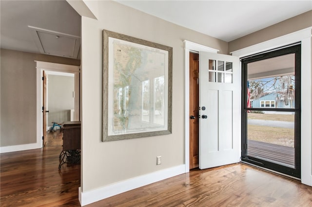 entryway with wood-type flooring