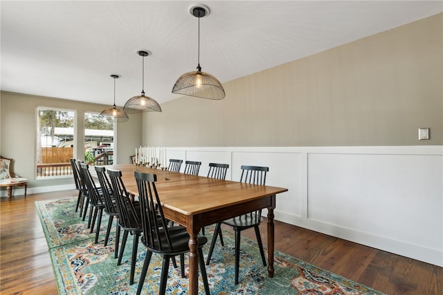 dining room with hardwood / wood-style floors