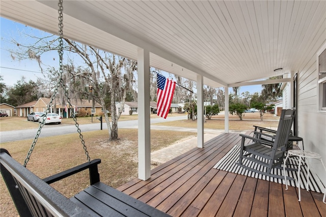 wooden terrace featuring a porch