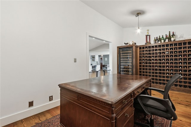 home office featuring hardwood / wood-style flooring