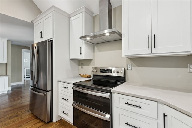 kitchen featuring wall chimney range hood, appliances with stainless steel finishes, white cabinetry, radiator heating unit, and dark hardwood / wood-style floors