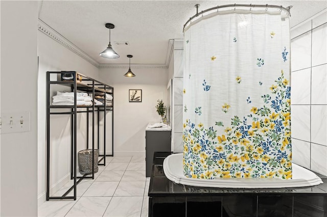 bathroom featuring visible vents, curtained shower, ornamental molding, marble finish floor, and a textured ceiling