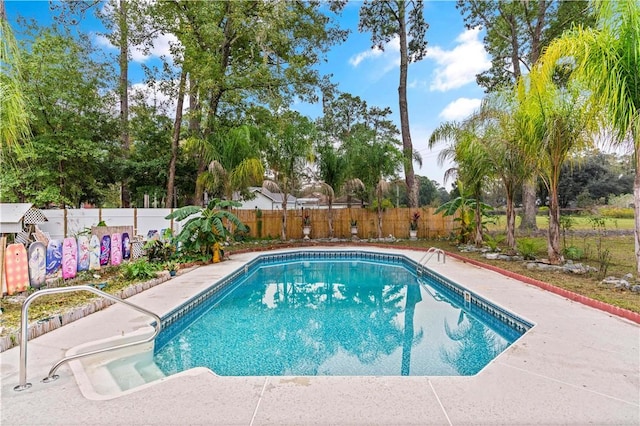 view of pool featuring a fenced in pool and a fenced backyard