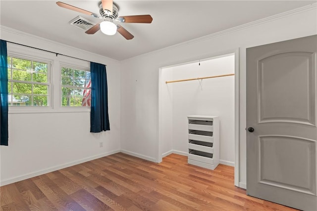 503 Wesley Oak Cir, Saint Simons Island, GA 31522 - unfurnished bedroom with crown molding, ceiling fan, light wood-style floors, baseboards, and visible vents